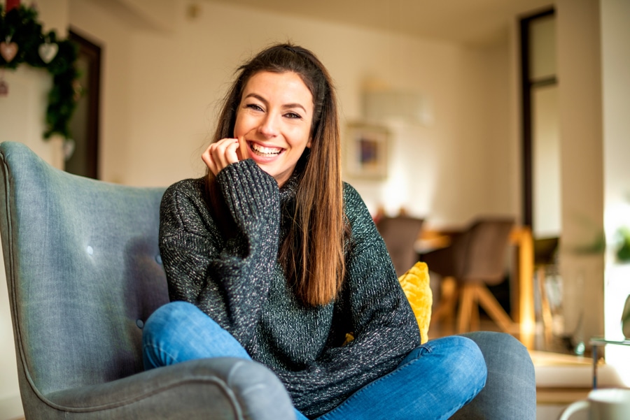woman smiling after mental health treatment